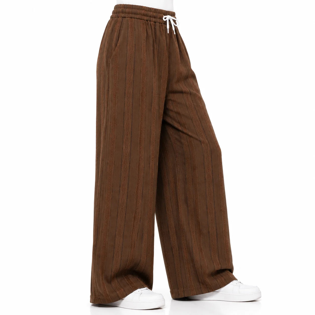 A pair of wide-leg brown pants with vertical textured stripes, featuring an elastic waistband with a white drawstring, modeled from the waist down on a white background.