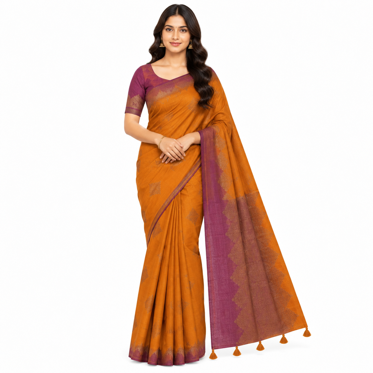 A woman modeling a traditional Indian saree with a mustard orange body and a deep purple border and pallu, paired with a matching purple short-sleeve blouse, set against a plain white background.