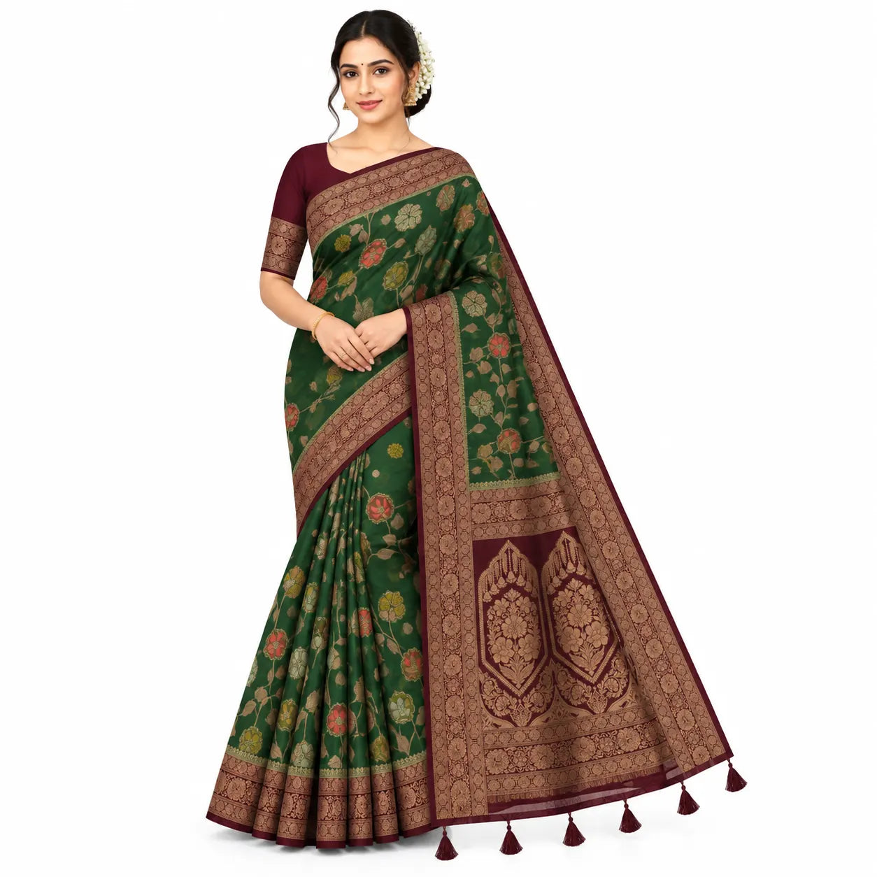 A woman models a dark green saree with intricate gold and brown floral patterns, a deep maroon border, and a matching maroon blouse against a plain white background.