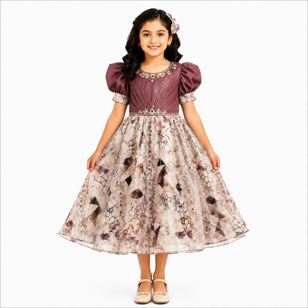 A young girl modeling a medieval-style dress with a dusty purple bodice and a full, patterned beige skirt, set against a plain white background.