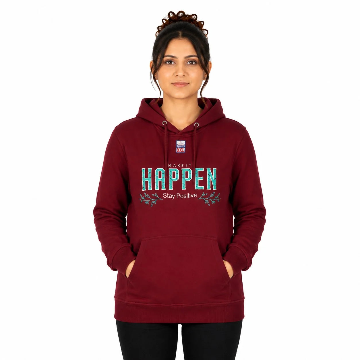 A woman wearing a maroon pullover hoodie with a graphic print that reads 'MAKE IT HAPPEN Stay Positive' in teal and white, set against a plain white background.