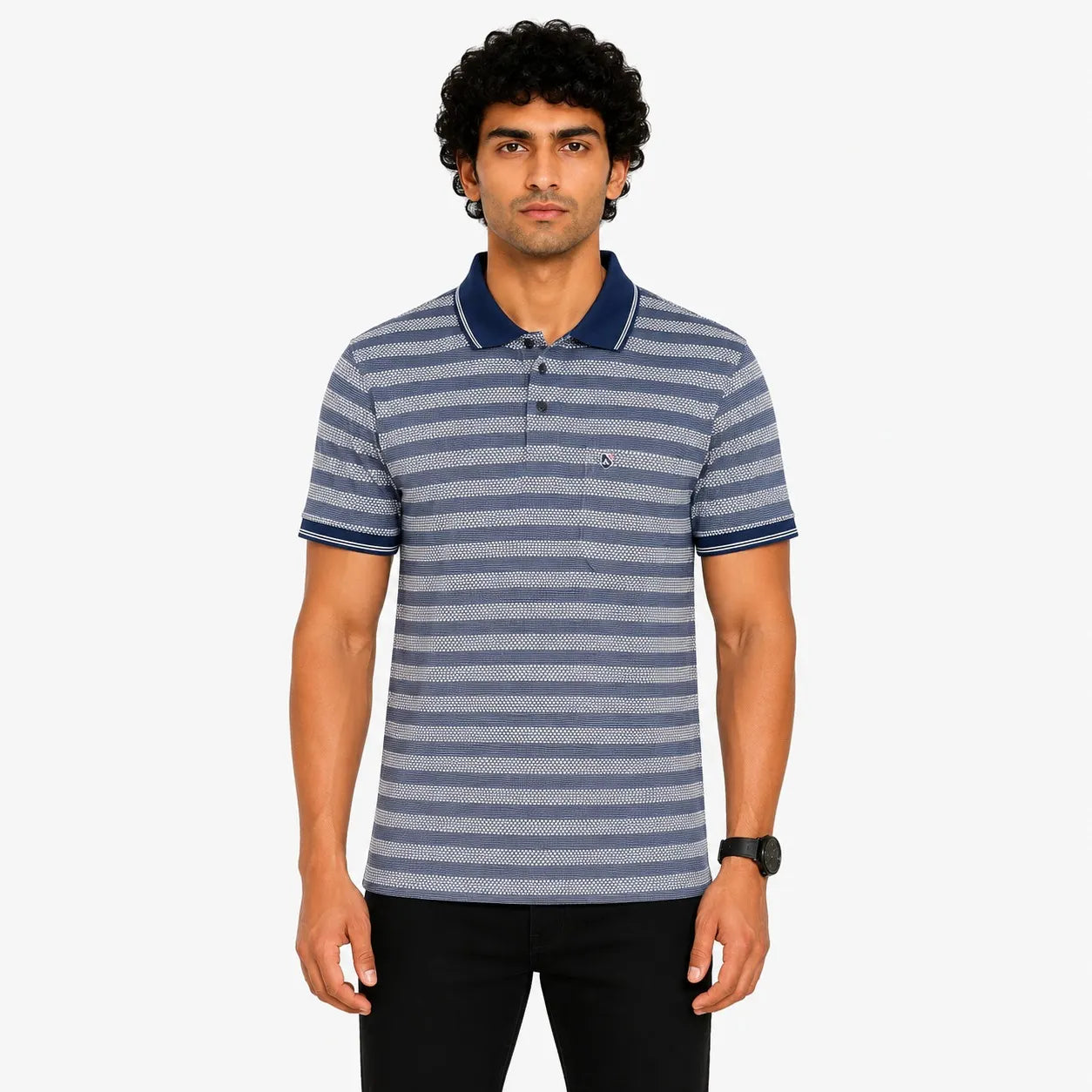 A man wearing a blue and gray horizontally striped short-sleeve polo shirt with a navy collar and sleeve trim, paired with black pants, against a light gray background.