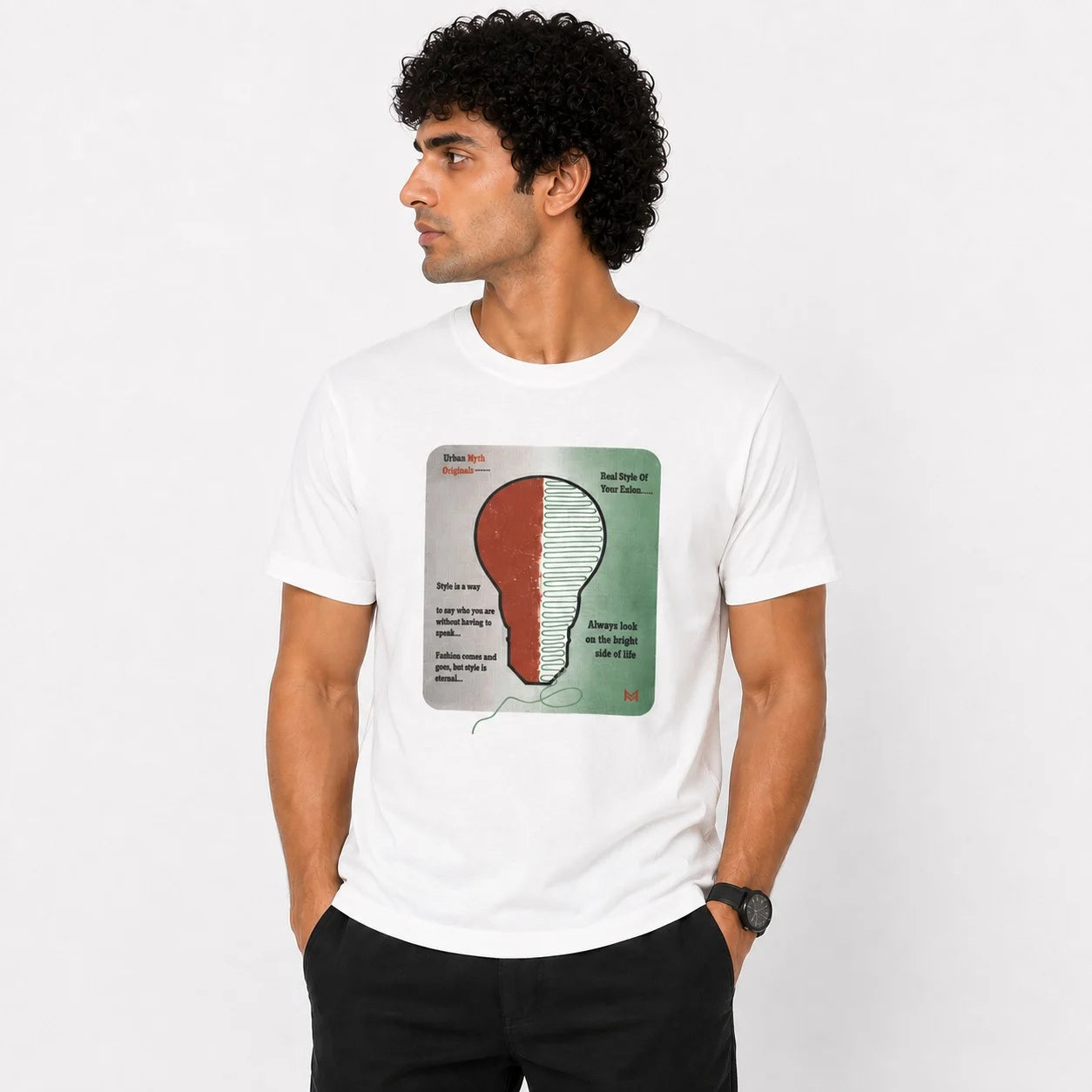 A man wearing a white crewneck t-shirt with a graphic print of a split brain illustration, posed against a clean white background.