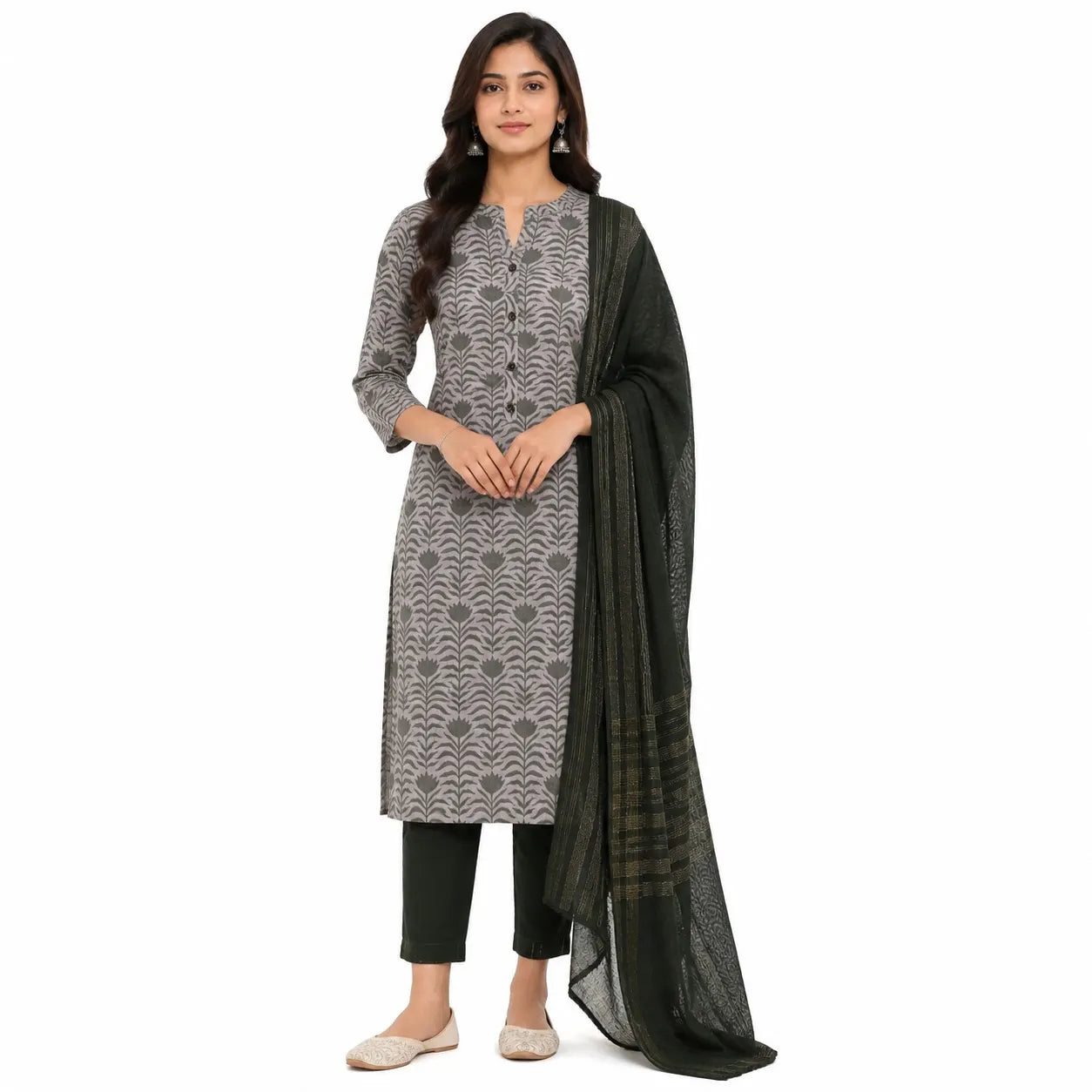 A woman modeling a traditional Indian salwar kameez set, featuring a gray and black patterned kurta, black pants, and a black dupatta, set against a plain white background.