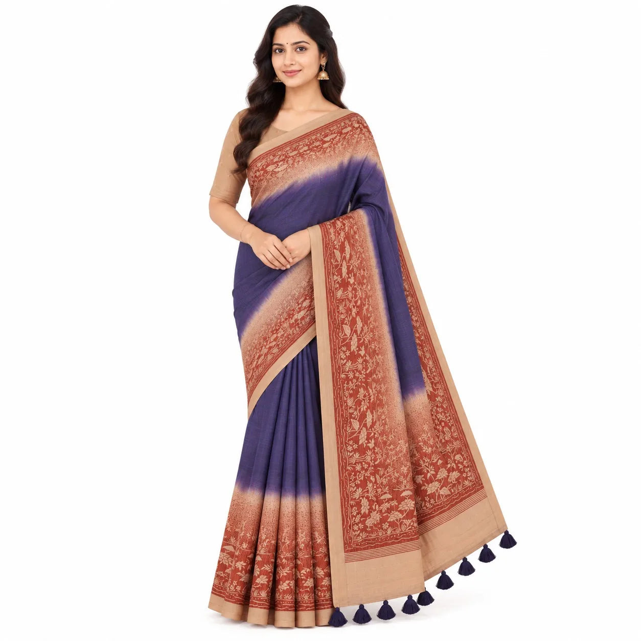 A woman modeling a purple and beige printed saree with a matching beige blouse against a plain white background.